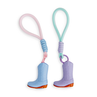Jollity & Co Boot Lip Balm
Two colorful keychains shaped like baby boots on a white background