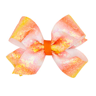 Wee Ones Candy Corn Ombre Sequin Hair Bow on Clippie 
Sequined hair bow with orange center on a white background
