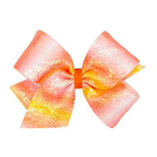 Wee Ones Candy Corn Ombre Sequin Hair Bow on Clippie 
Multicolored bow with sequins on a white background