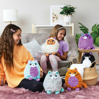 Schylling Misfittens Surprise Cat
 Two girls playing with plush toys in a living room setting