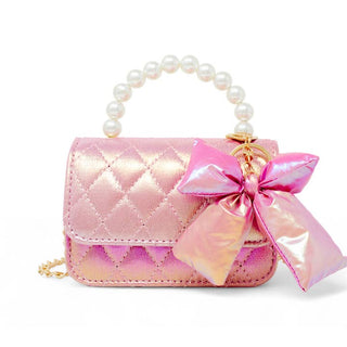Zomi Gems Shiny Quilted Fluffy Bow Handbag - Hot Pink
Pink quilted handbag with a bow and pearl handle on a white background