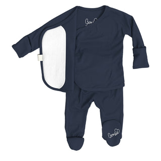 Bonsie Footie - Midnight Blue
Navy baby outfit with white lining on a white background