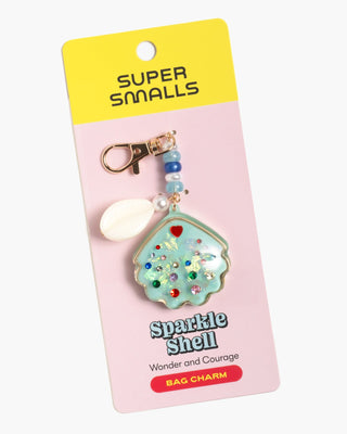 Super Smalls Sparkle Shell Bag Charm
Sparkle shell bag charm on a Super Smalls branded card with a yellow top section.