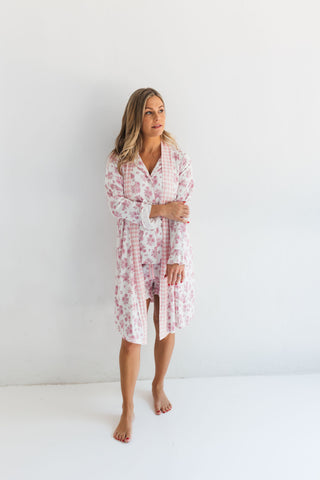 In My Jammers Blush Rose Garden Women's Robe
Woman wearing a floral nightshirt against a white background