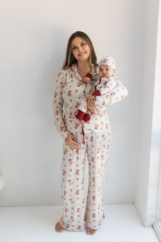 In My Jammers Bear-y Merry Women’s Set
Woman and baby wearing matching pajama sets in a room with a white background