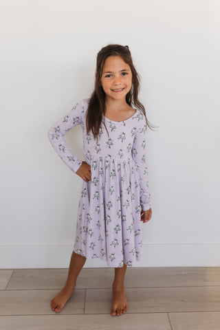 In My Jammers Ballerina Ghost Long Sleeve Twirl Dress 
Young girl wearing a long-sleeve floral dress against a white background