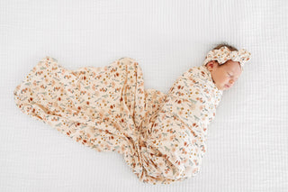 Lou Lou and Company Swaddle Blanket - Rachel
Newborn baby swaddled in a floral blanket on a white background