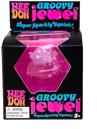 Schylling NeeDoh Groovy Jewel Three packages of Nee Doh Groovy Jewel with pink, blue, and purple colors on a white background.
