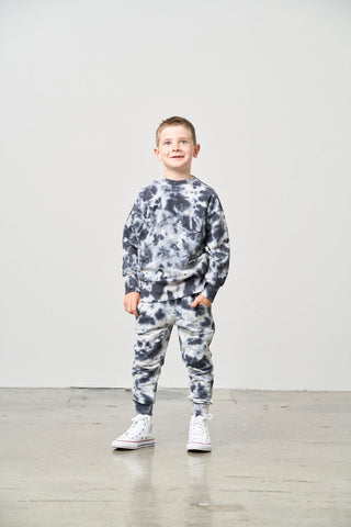 Little Bipsy Marble Pullover - BlueChild wearing a tie-dye outfit with white sneakers on a plain background