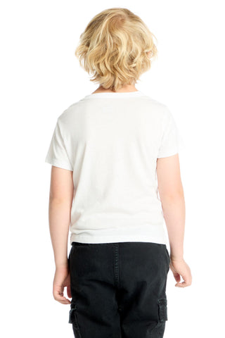 Chaser Varsity Icons Tee Person wearing a white t-shirt and black pants on a white background