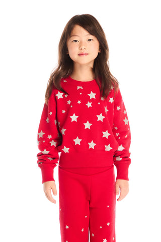 Chaser Danni Rouge Star Pullover
Child wearing a red sweater with white star patterns on a white background