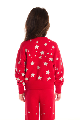 Chaser Danni Rouge Star Pullover
Person wearing a red outfit with star patterns on a white background