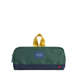 State Bags Clinton Pencil Case - Green / Navy Green bag with a yellow handle and blue label on a white background
