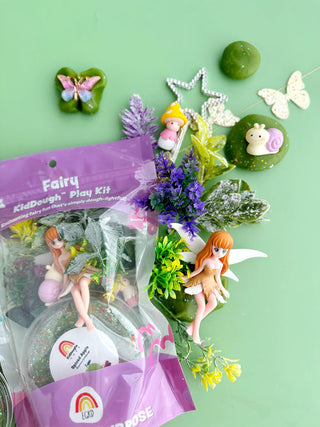 EGKD Earth Grown KidDoughs Fairy KidDough Play Kit  Fairy-themed play kit with figurines, flowers, and accessories on a green background