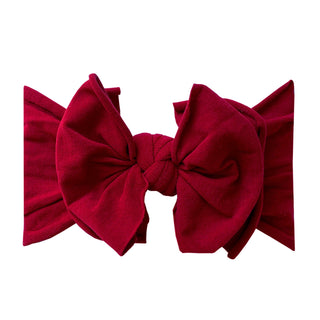 Baby Bling FAB Headband - Ruby
Red bow on a white background