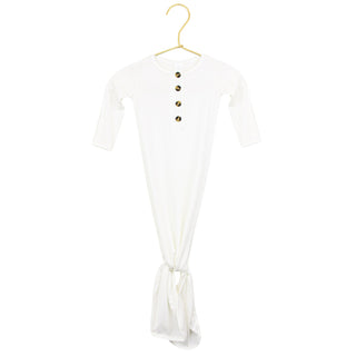 Lou Lou and Company Knotted Gown - Finley
White long-sleeve shirt with buttons on a hanger against a white background