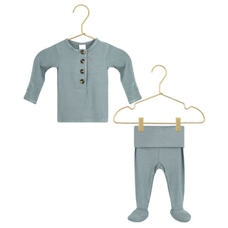 Lou Lou and Company Ribbed Top and Bottoms - Ford
Baby outfit with shirt and pants on hangers against a white background