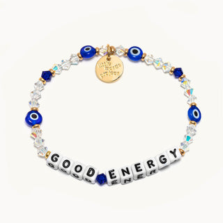 Little Words Project Bracelet - Good Energy: Lucky Symbols
crystals, and a gold tag on a white background