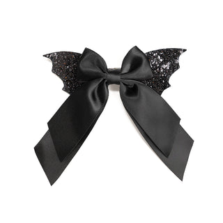 Sweet Wink Glitter Bat Halloween Coquette Bow Clip
Black bow with bat wing-shaped ends on a white background