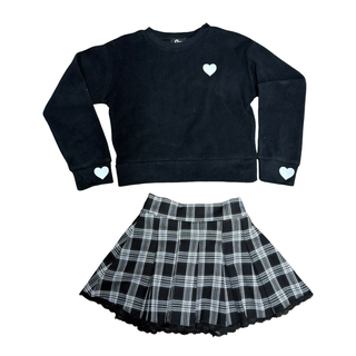 FBZ Black Plaid Lace Trim Skort
FBZ Black with White Heart Sweatshirt
Black sweatshirt with heart details and plaid skirt on a white background