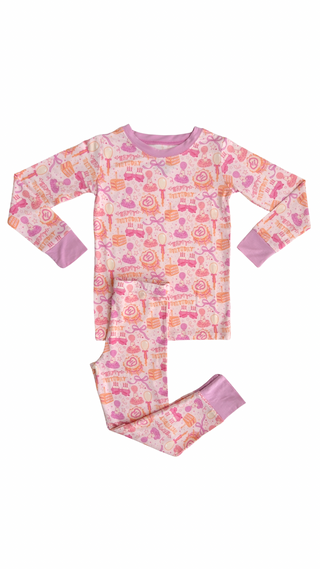 In My Jammers Two Piece Set - Birthday Girl
Children's pajama set with pink and orange pattern on a white background