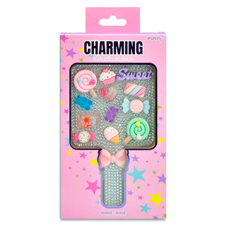 Iscream Charming Rhinestone Mirror
Packaged hairbrush with decorative charms on a pink background, featuring the brand 'Charming'.