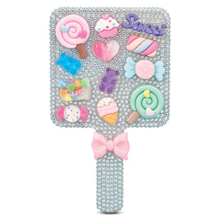 Iscream Charming Rhinestone Mirror
Decorative phone case with candy-themed designs and a bow on a white background