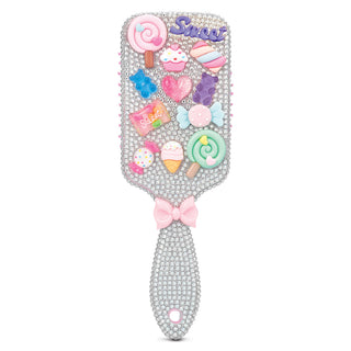 Iscream Charming Rhinestone Paddle Brush
Decorative hairbrush with candy-themed decorations on a white background