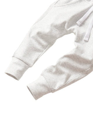 Little Bipsy Jogger - Light Heather Grey 
Close-up of a white sweatshirt on a light gray background