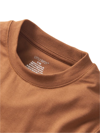 Little Bipsy Oversized Bamboo Tee - Chestnut
Close-up of a brown shirt with 'Little Bipsy' label on a white background