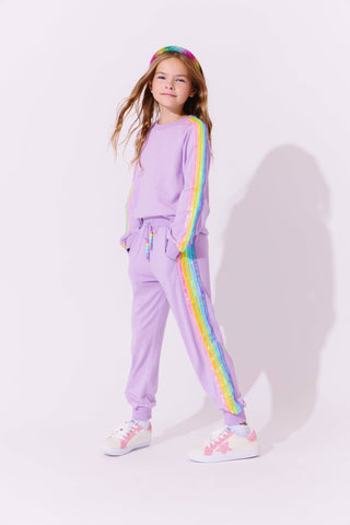 Lola and The Boys Lavender Rainbow Sequin Set Young girl wearing a lavender tracksuit with rainbow stripes on a white background