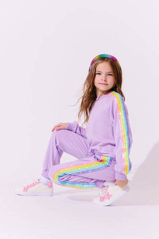 Lola and The Boys Lavender Rainbow Sequin Set Child wearing a purple outfit with rainbow accents on a white background