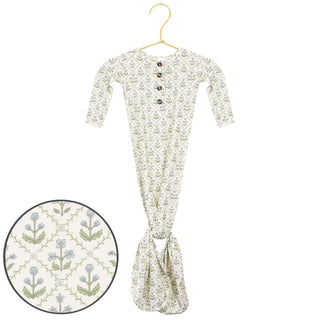 Lou Lou and Company Knotted Gown - Etta
Floral-patterned baby onesie on a hanger with a close-up of the fabric texture.