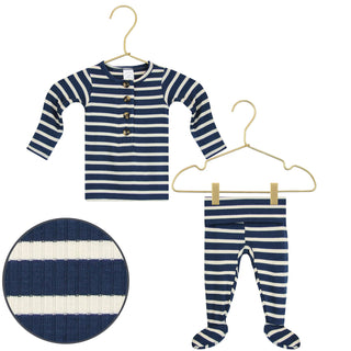Lou Lou and Company Ribbed Top and Bottoms - Jack
Navy and white striped baby outfit with shirt and leggings on hangers against a white background.
