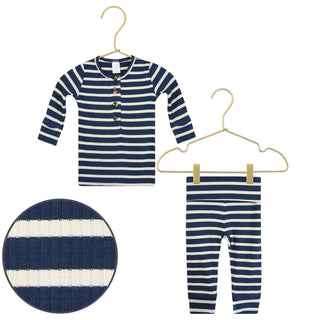 Lou Lou and Company Ribbed Top and Bottoms - Jack
Navy and white striped children's outfit on hangers with a close-up of the fabric texture.