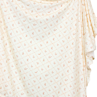 Lou Lou and Company Swaddle Blanket - Annie
Folded fabric with a subtle pattern on a white background