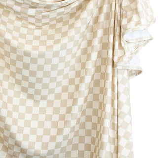 Lou Lou and Company Swaddle Blanket - Austin
Beige and white checkered fabric with a slight texture