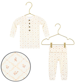 Lou Lou and Company Top and Bottoms - Annie
Baby outfit with long-sleeve top and pants on hangers against a white background