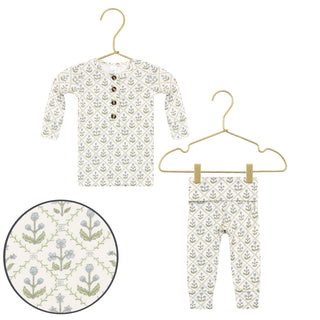 Lou Lou and Company Top and Bottoms - Etta
Baby outfit with floral pattern on a hanger against a white background