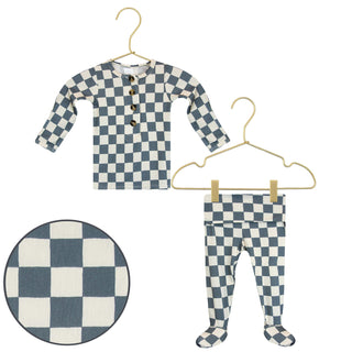 Lou Lou and Company Top and Bottoms - Miles
Children's checkered outfit with shirt and pants on hangers against a white background