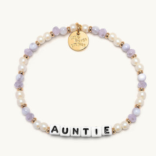 Little Words Project Bracelet - Auntie
Pearl bracelet with 'AUNTIE' charm on a white background