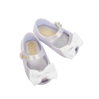 Mini Melissa My First Melissa - Pearly White Pair of white shoes with bows on a white background