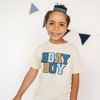 Sweet Wink Birthday Boy Patch Short Sleeve T-Shirt - Natural 
Child wearing a 'BDAY BOY' t-shirt with a white background