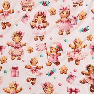 Posh Peanut Bow Twirl Dress - Ginger Posh
Pattern of gingerbread girls in dresses with cookies and candies on a light pink background