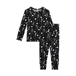 Posh Peanut Funny Bones Glow in the Dark Classic Pajama Set
Black pajama set with white star and skeleton pattern on a white background