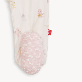 Magnetic Me Pink Baby Beats Modal Footie Baby bunting with pink and white pattern on a white background