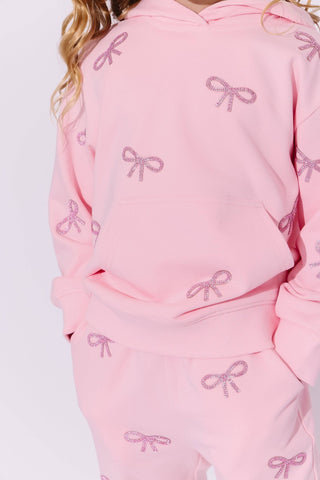 Lola and The Boys Pretty in Crystal Bows Set Pink hoodie and pants set with bow patterns on a white background
