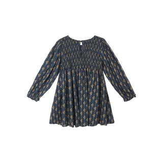 Rylee & Cru Capri Dress - Vintage Bloom Navy blue dress with gold patterns on a white background