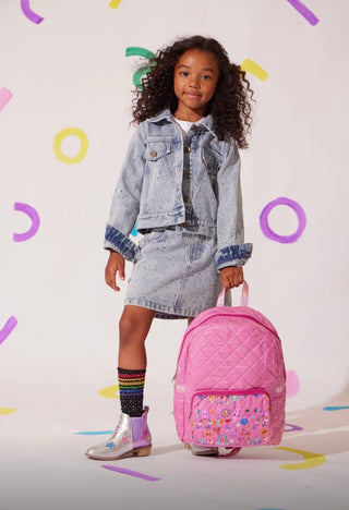 Lola and The Boys Rainbow Sparkle Denim Jacket
Child holding a pink backpack against a colorful background