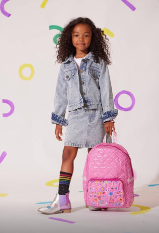 Lola and The Boys Rainbow Sparkle Denim Skirt
Child holding a pink backpack with colorful design on a white background